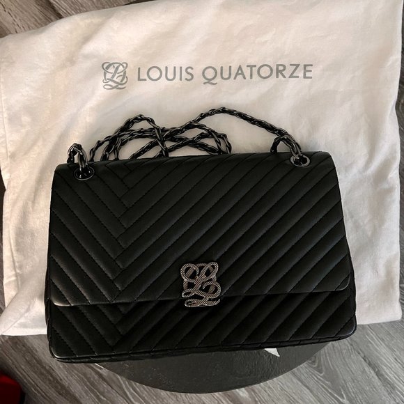 Who me? Louis Quatorze handbag winner